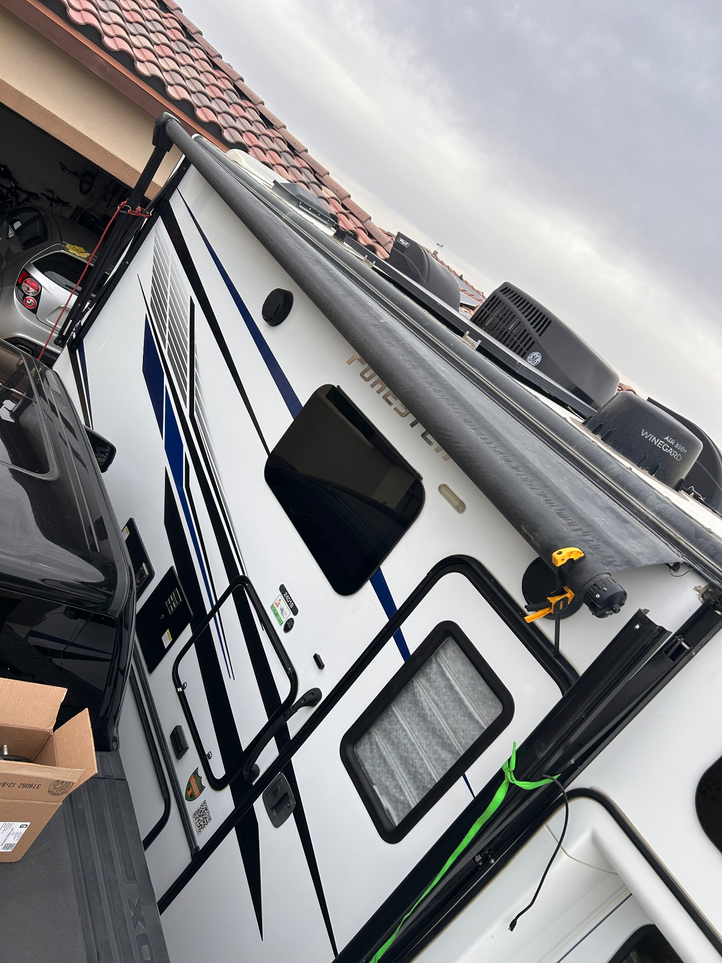 Travel trailer awning at an on-site service visit
