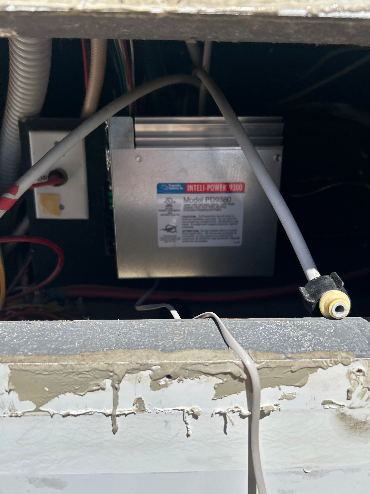 RV power converter and wiring during inspection
